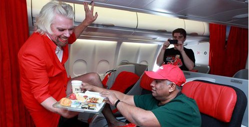 Branson Finally Graduates as AirAsia's Flight Attendant